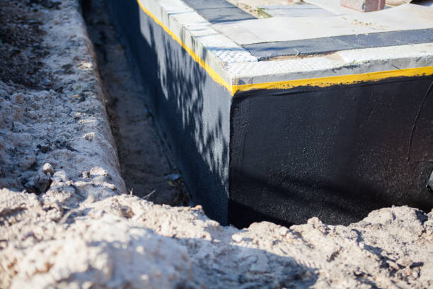 Professional Waterproofing technician working in Auburn, IN